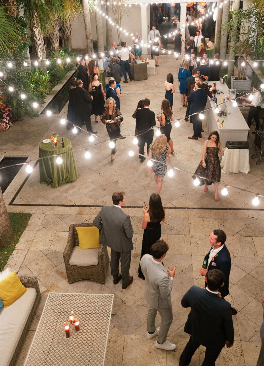 An art-inspired wedding in Charleston included an al fresco cocktail hour at Cannon Green.