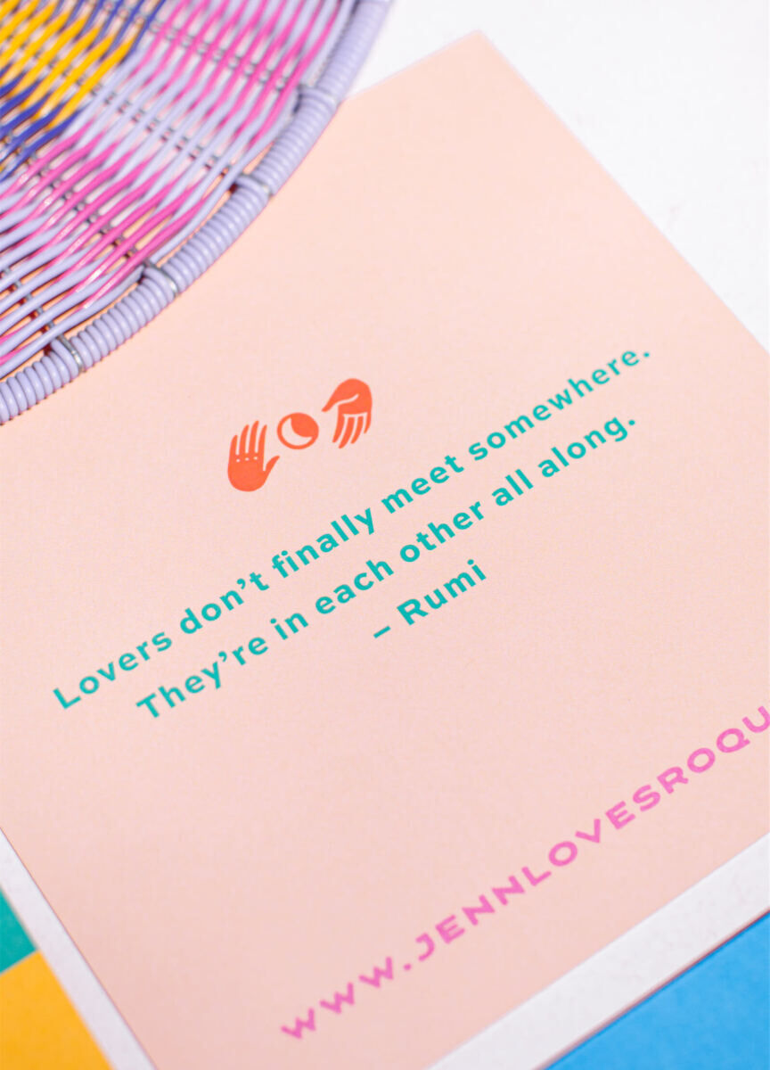 A meaningful quote and the couple's signature motif adorned the details card directing guests to the website for their upcoming vibrant, outdoor wedding.