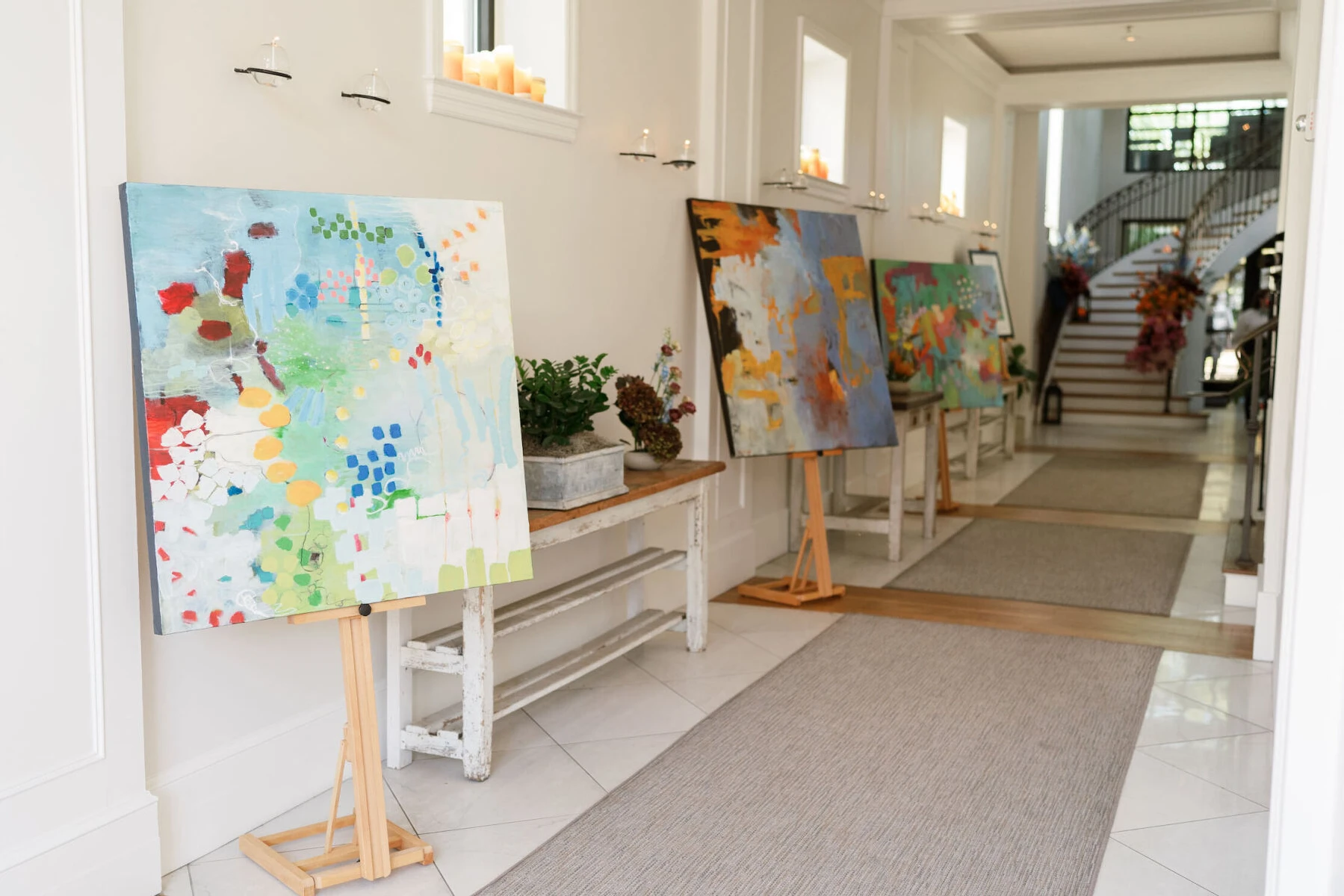 A gallery greeted guests as they entered Cannon Green for an art-inspired wedding.